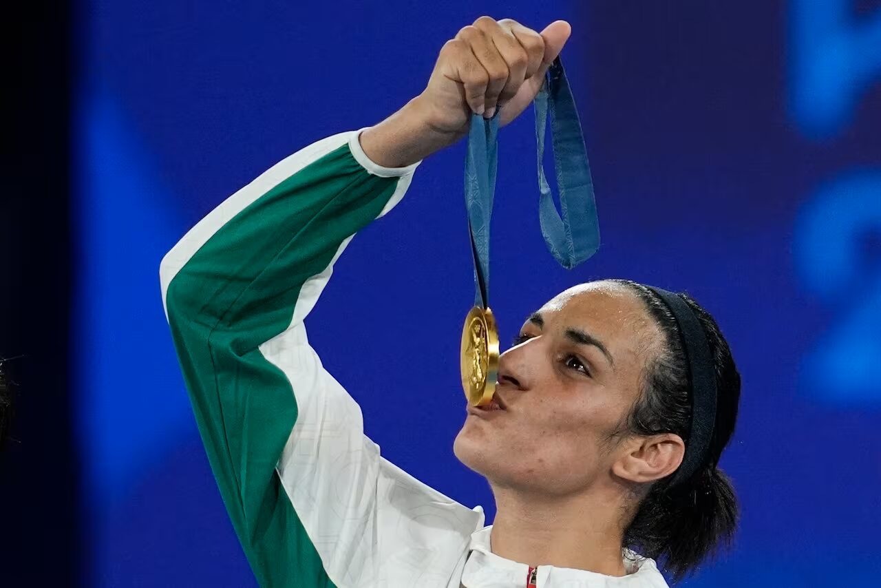 championne - La championne olympique de boxe féminine, accusée d'être un homme, dénonce une possible plainte criminelle contre le CIO