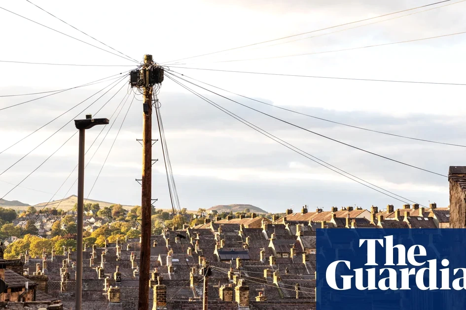 Maisons mitoyennes au Royaume-Uni, façades en briques alignées le long d’une rue résidentielle en hiver
